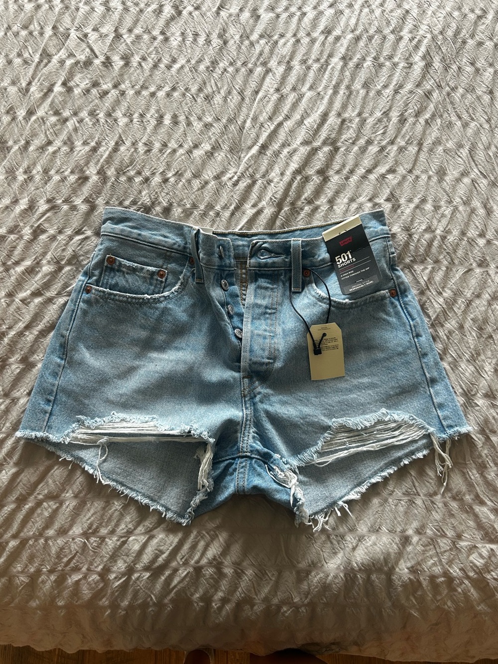 Levi's Light Blue Distressed High-Rise Jean Shorts